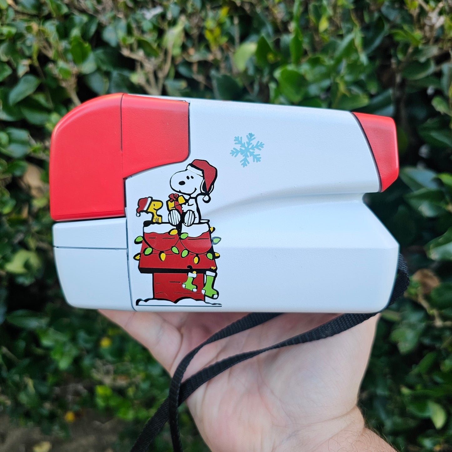 A Charlie Brown Snoopy Polaroid Camera