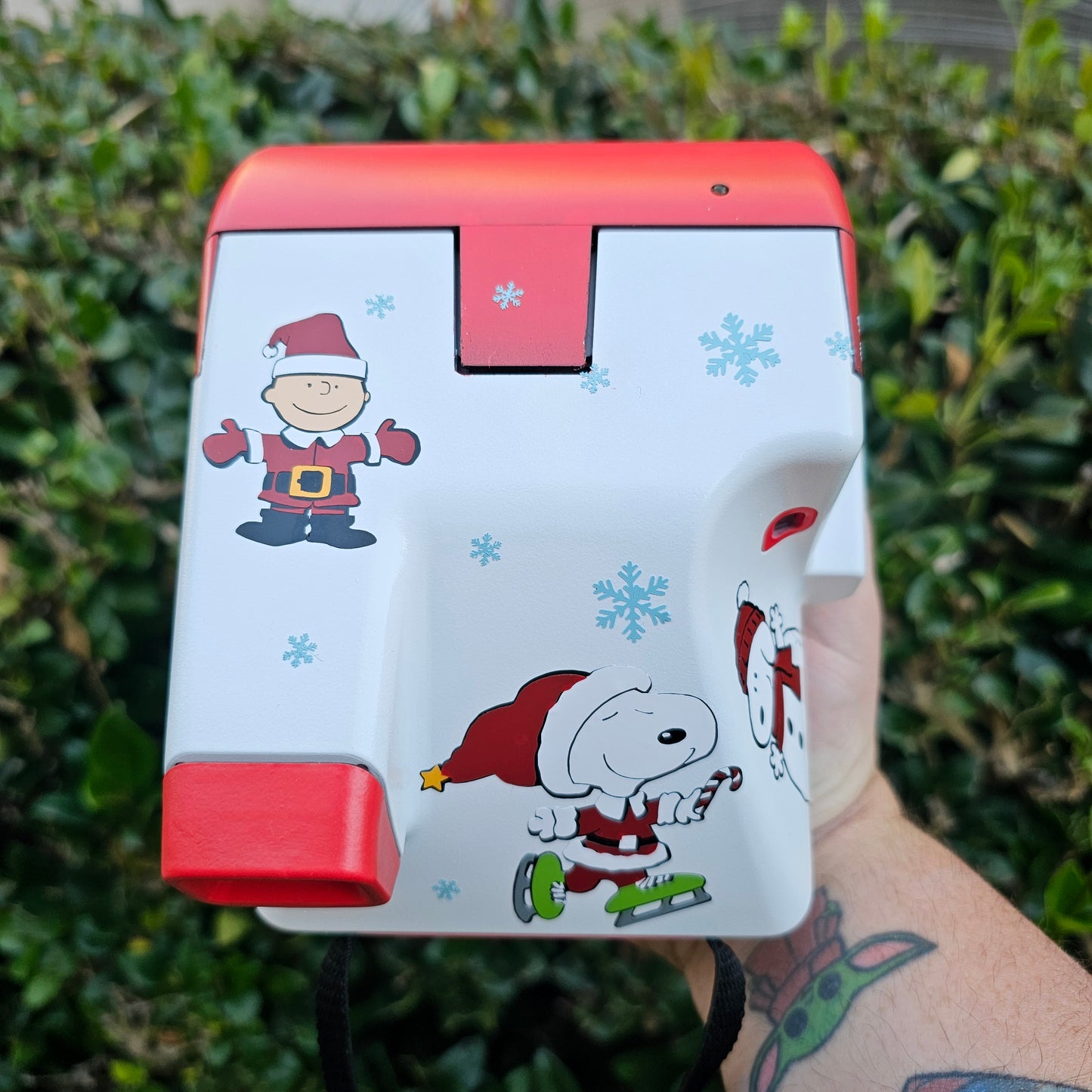 A Charlie Brown Snoopy Polaroid Camera