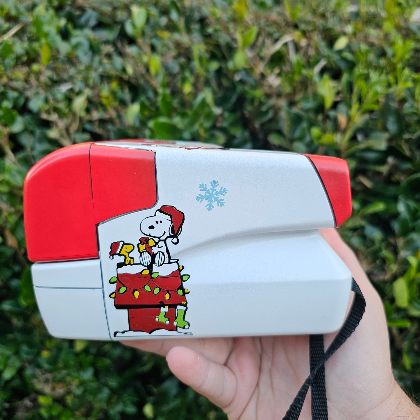 A Charlie Brown Snoopy Polaroid Camera